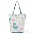 Dettaglio della borsa shopper in tela con stampa dinosauro carino e grande capienza. - Dinosauro e Cactus (hl0338)