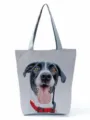 Close-up detail of grey canvas tote bag featuring cute dog print and sturdy red collar handle. - Black and White Dog Portrait Red Collar (hl2811)