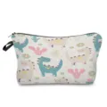 Detailed view of the cute dinosaur print makeup pouch, showing clear fabric texture. - Dinosaur Style 4
