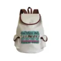 Vista detallada de la mochila de lona con estampado de enfermera y ribetes de cuero marrón. - Sj4532