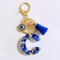 Blue resin letter C keychain with blue tassel and evil eye charm for women gifts - Letter C
