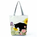 Detailed view of the black cat floral canvas tote bag, featuring vibrant watercolor design. - Black Cat and Sunflower (hlk2474)