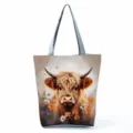 Highland cow print tote bag closeup detail, canvas shoulder bag featuring cute animal design. - Highland Cow Floral Front Style (hlk3322)