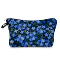 Close-up detail of the blue floral print cosmetic bag showing delicate flower pattern and zipper. - Blue Ditsy Plant Print (hzk3516)