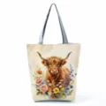 Highland cow print canvas tote bag detail, featuring watercolor floral design and sturdy gray handles. - Exquisite Watercolor Highland Cow Style (hlk3326)