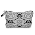 Mandala print detail view of the black and white cosmetic makeup storage pouch bag. - White Mandala On Black (hzk0405)