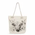 Close-up detail of the black and white Highland cow sketch print on the canvas tote bag. - Highland Cow Butterfly Sketch (msk3321)