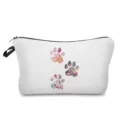 Vista detallada de la bonita bolsa de cosméticos con estampado de huellas de perro. - Tres Grupos de Patas Florales Blanco (hz4389)