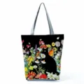 Detailed view of the black cat floral printed tote bag showing exquisite art design and strap. - Black Cat and Butterfly Flowers (hlk2485)