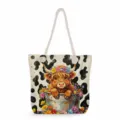Close-up detail of the canvas tote bag featuring a cute highland cow print and thick rope handles. - Highland Cow Milk Pattern (msk3328)