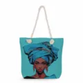 Fashion canvas tote bag featuring stylish African woman print with comfortable rope handles. - Blue Black Woman Art Print (msk3500)