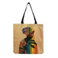 Vista de cerca del bolso de lona con estampado artístico de mujer africana detalles. - Estilo de Planta Arcoíris Fondo Natural (hmk3503)
