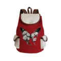 Red canvas backpack with white flap pocket and floral butterfly print design details. - Red And White Monochrome Floral Butterfly Style (sjk0431)