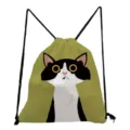 Detail view of the cute black and white cat graphic printed on the green canvas drawstring backpack. - Green Big Eyed Cat Cartoon Style (sk3548)