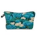 Close-up view of the blue floral print cosmetic bag showcasing the detailed vibrant pattern. - White Base Light Blue Small Floral Print (hz5189)