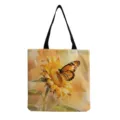 Close-up of the watercolor sunflower and butterfly print on the canvas tote bag fabric. - Watercolor Sunflower and Butterfly Style (hmk2939)