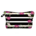 Detailed view of the stylish cosmetic bag featuring black white stripes and colorful floral prints. - Black and White Striped Colorful Flower Print (hz5198)