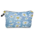 Detailed view of the blue daisy floral print cosmetic bag showing fabric texture and zipper. - White Daisy Print on Blue Base (hz5200)