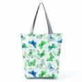 Detailed view of a fashionable women's shoulder tote bag featuring a watercolor butterfly print. - Shoulder Tote Style (hlk2702)