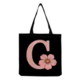 Black canvas tote bag with pink letter G print, reusable casual shoulder handbag for women - Letter G Style (hmk2864)