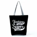 Large capacity canvas tote bag with teacher letter print, casual shoulder bag for daily use. - Style Six (hl5394)