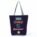 Teacher quote printed graphic detail on black canvas tote bag for daily office use. - Style Eight (hl5396)