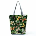 Close-up detail of watercolor butterfly print fabric tote bag with elegant green leaf design. - Shoulder Tote Style (hlk2709)