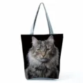 Detailed view of the cat print tote bag fabric, featuring a realistic feline portrait and sturdy gray straps. - Longhair Cat Portrait Print (hl5099)
