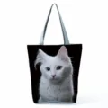 Large capacity casual shoulder tote bag featuring a cute white cat print against a black background. - White Cat on Black Background Print (hl5104)