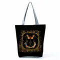Elegant black canvas tote bag featuring a stunning golden butterfly and floral print design. - Shoulder Tote Style (hlk2719)
