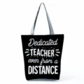 Close-up detail of teacher appreciation tote bag with printed text, canvas shoulder bag view. - Style Twenty (hl5408)