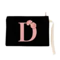 Black canvas cosmetic pouch detail showing pink floral letter D print and white wrist strap. - Letter D Style (xbk2865)
