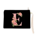 Detailed view of the black canvas cosmetic pouch featuring a pink floral letter E design. - Letter E Style (xbk2866)