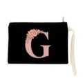 Detailed view of black cosmetic pouch with pink floral letter G, white wrist strap and zipper. - Letter G Style (xbk2868)