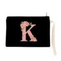 Detail view of the black cosmetic bag with pink floral letter K print and white wrist strap. - Letter K Style (xbk2872)