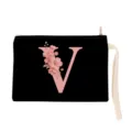 Close-up detail of the black makeup pouch featuring a floral letter V print and wrist strap. - Letter V Style (xbk2883)