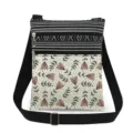 Close-up detail of the printed canvas crossbody bag featuring dual zippered pockets and pattern. - Pink Tulip Style (xk12517)