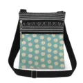Canvas crossbody bag detail showing double zippers, black white stripes, and daisy print pattern. - Cyan With White Daisy (xk12521)