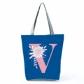 Blue canvas tote bag with pink floral letter V print large capacity shoulder handbag - Letter V