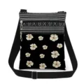 Detailed view of lightweight crossbody messenger bag with double zippers, floral print and strap. - Black With White Floral (xk12530)