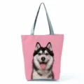 Detailed view of the cute husky printed canvas tote bag with pink background and grey straps. - Pink Background Husky Print Style (hl7396)