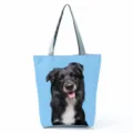 Cute black dog print canvas shoulder tote bag, large capacity casual daily travel handbag. - Blue Background Black Dog Print (hl7414)