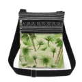 Close-up of lightweight canvas crossbody bag with tropical palm tree print and dual zippers. - Classic Green Leaves Palm Tree Style (xk1130)