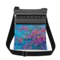 Detail view of the floral printed crossbody bag showing double zipper and adjustable strap. - Blue Tone Floral Oil Painting Style (xkk2677)