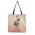 Detailed view of the vintage Eiffel Tower print canvas tote bag, featuring a large capacity design. - Pink Eiffel Tower And Butterfly Art Style (hm7291) / 40x38cm