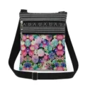 Detailed view of small crossbody bag with colorful floral print and black striped top. - Vibrant Floral Print (xk6519)