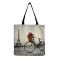 Detailed view of the Eiffel Tower print canvas tote bag, featuring sturdy black handles. - Eiffel Tower And Bicycle Landscape Style (hm7297) / 40x38cm