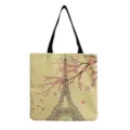 Detail view of canvas tote bag featuring Eiffel Tower and cherry blossom print design. - Eiffel Tower And Pink Cherry Blossom Style (hm7298) / 40x38cm