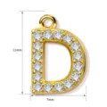 Verguld koperen letter D hanger met sprankelende kristallen steentjes, afmeting 11x7mm. - Letter D