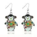 Detail shot of Christmas penguin enamel dangle earrings with colorful crystal stars. - Christmas Penguin Style (EHLT-25825-CAIS)